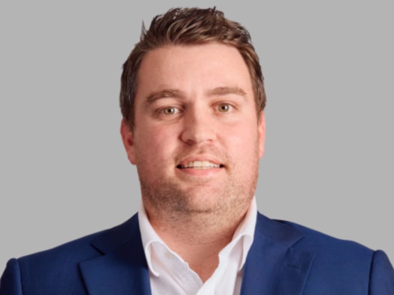 “Professional headshot of Nathan vom Bruch, a Partner in the Sydney Corporate Finance division. He is dressed in business attire, presenting a confident and approachable expression, suitable for a corporate finance executive.”